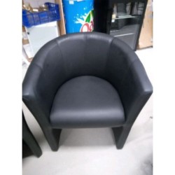 Deux fauteuils  simili cuir 