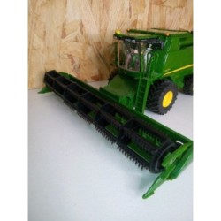 Tracteur moissonneuse vert